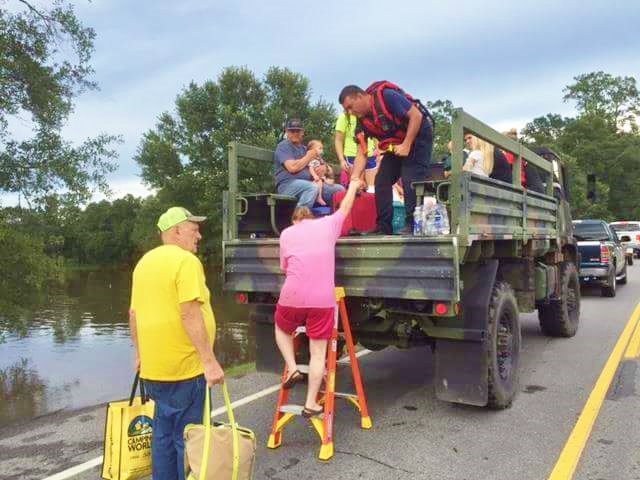 Tangipahoa flood rescue efforts by Covington Police and Fire Departments in CPD High Water Vehicle.